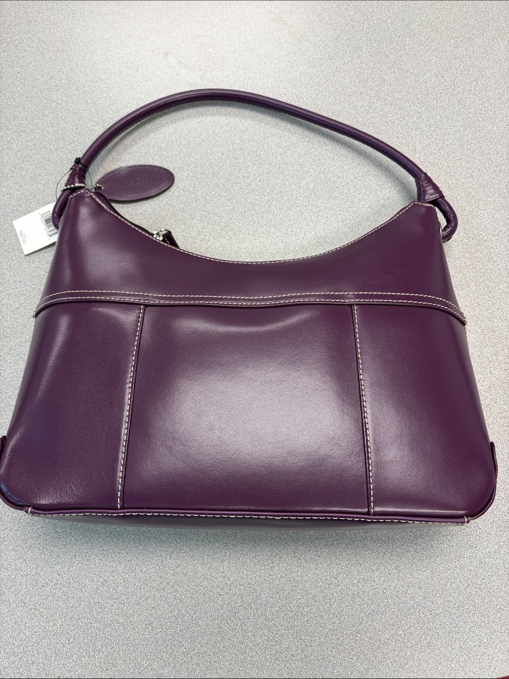 Purple Wilson’s leather bag